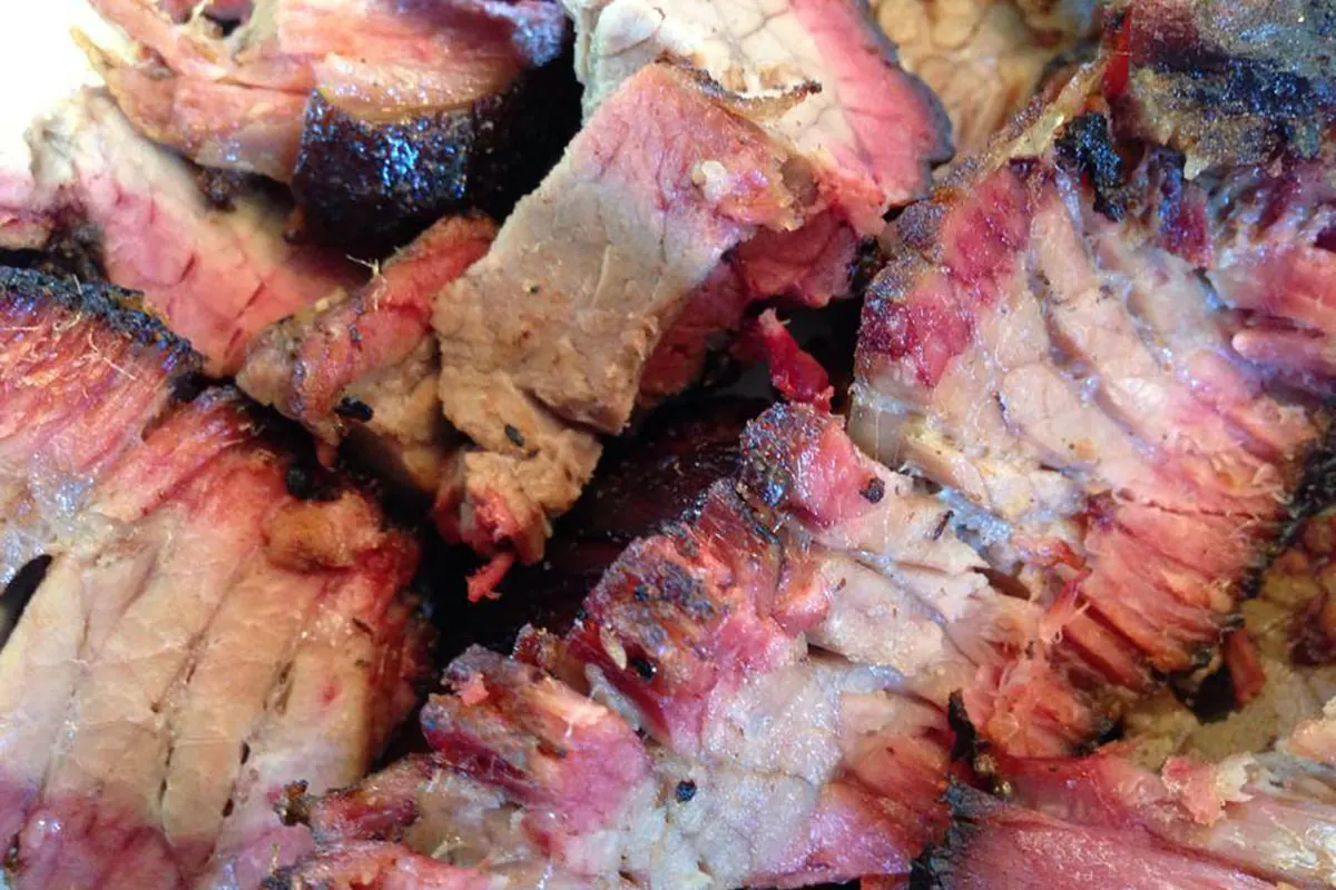 Sliced brisket with a dark bark